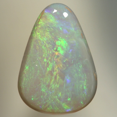 SOLID SEMI BLACK OPAL Greens and a touch of orange sparkle constantly